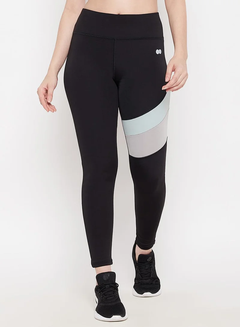Clovia Black Snug Fit High-Rise Active Tights in Black for Women | Best Price UAE